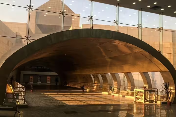 Grand Egyptian Museum entrance hall in Giza, modern glass atrium on a private guided museum tour