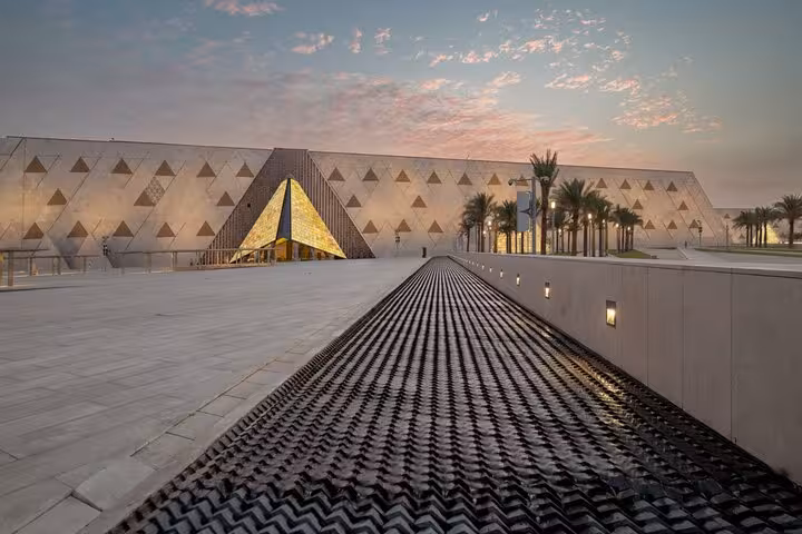 Grand Egyptian Museum entrance at sunset in Giza, Cairo private guided tour with skip-the-line access