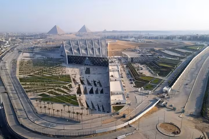 Aerial view of Grand Egyptian Museum near Giza Pyramids, ideal for private Cairo tour with guide