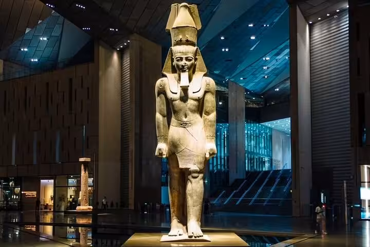 Grand Egyptian Museum atrium statue in Cairo on Hurghada small group tour with Giza Pyramids visit