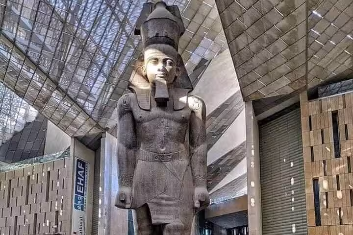 Colossal pharaoh statue inside Grand Egyptian Museum Cairo, highlight of private guided tour