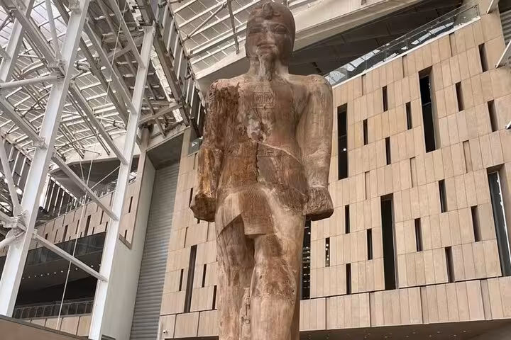 Massive pharaoh statue inside the Grand Egyptian Museum in Cairo, featured on a private guided tour