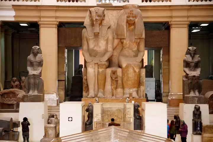 Grand Egyptian Museum statues in Cairo on private day tour from Port Said to Giza and museum highlights