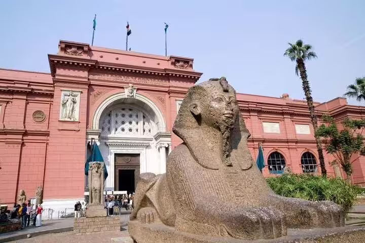 Granite sphinx statue at Egyptian Museum Cairo stop on Pyramids of Giza tour from Hurghada by minivan