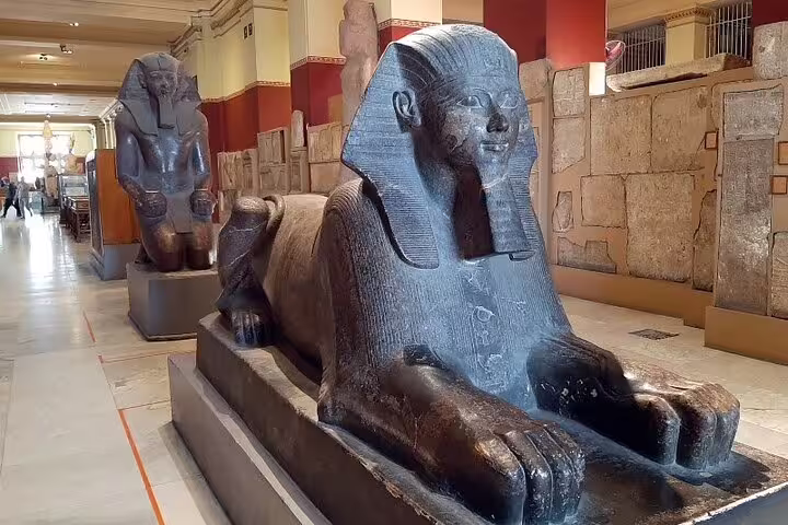 Granite sphinx statue in the Egyptian Museum Cairo gallery, included in Pyramids of Giza private tour