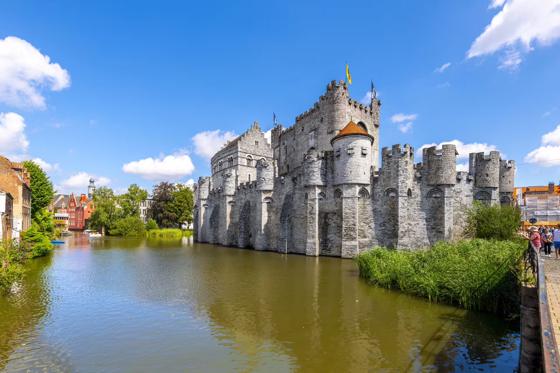 Gravensteen Castle on the canal in Ghent, key stop on a 1-day walking tour with 7-language audioguide
