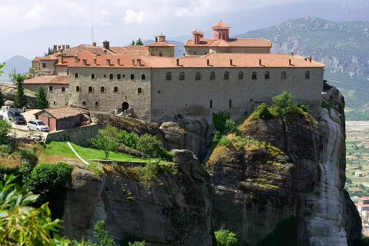 Great Meteoron Monastery perched on Meteora cliffs, highlight stop on Delphi and Meteora 2-day private tour