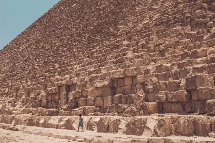 Close-up of Great Pyramid limestone blocks at Giza, a highlight of Cairo luxury pyramids tour