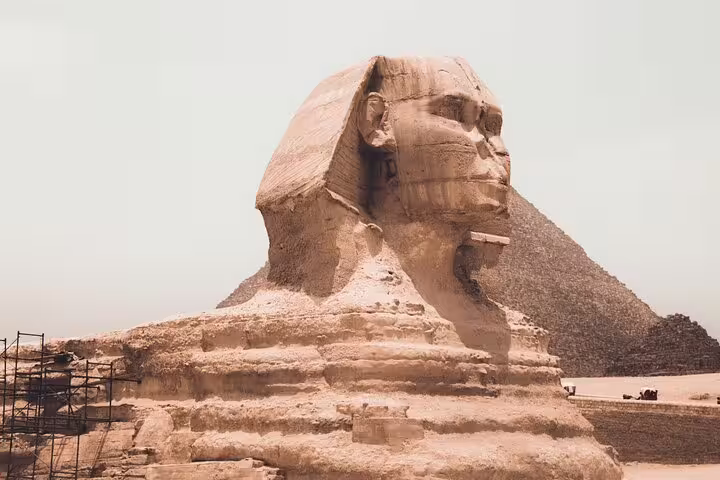 Great Sphinx with Giza Pyramid backdrop on luxury Cairo tour to Pyramids, Memphis, Sakkara and Dahshur
