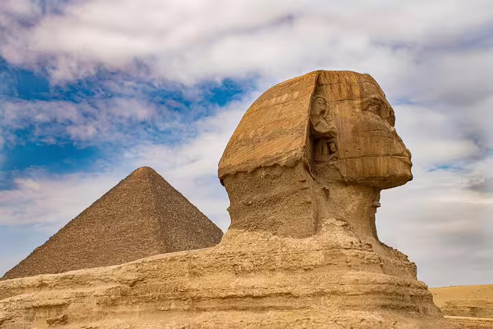 Side view of the Great Sphinx and Giza Pyramid on private guided tour, no hidden cost Cairo excursion