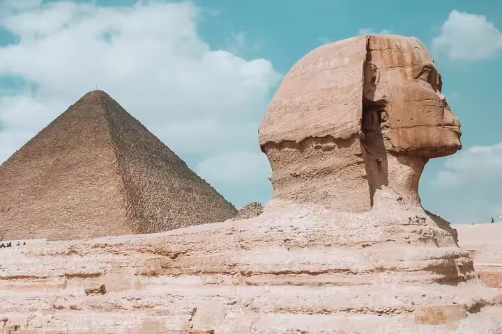 Great Sphinx of Giza with pyramid backdrop on private guided tour, including transfers and skip-the-line tickets