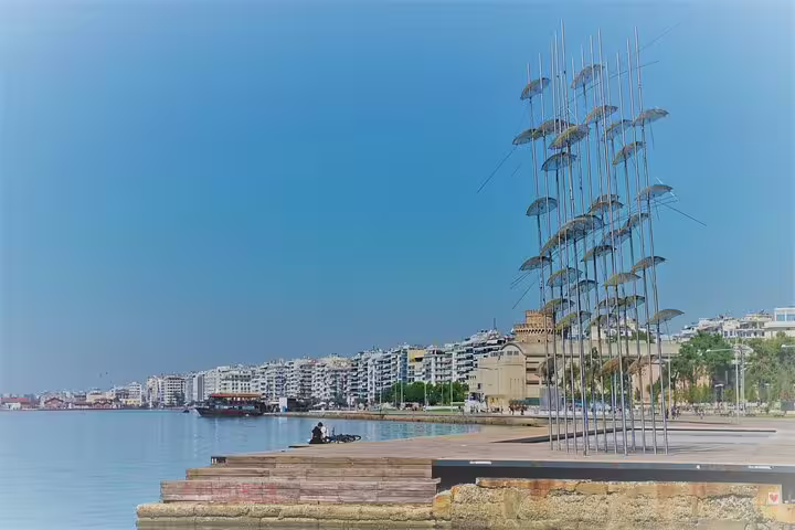Iconic Umbrellas sculpture by Zongolopoulos along Thessaloniki's waterfront, perfect for a Greece private tour.