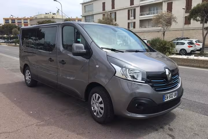 Grey minivan for private transfer Marseille to Avignon, modern chauffeur vehicle parked curbside