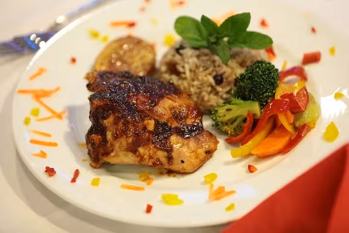 Grilled chicken dinner plate served on Istanbul New Year's Eve Bosphorus party cruise with meal