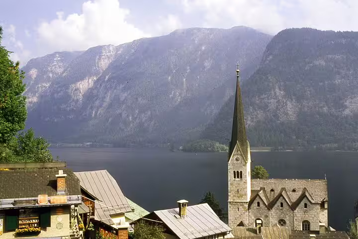 Hallstatt lakeside church and alpine cliffs view, perfect for a self-guided scavenger hunt and highlights walk