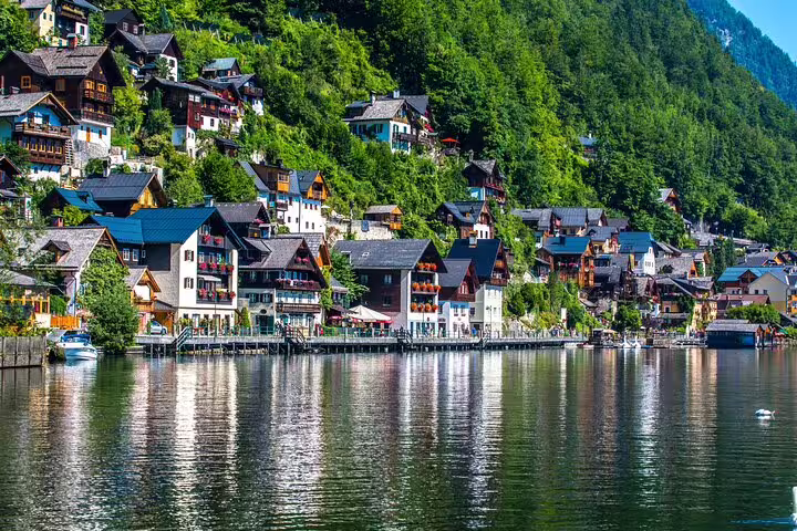 Colorful lakeside houses in Hallstatt, Austria, ideal view for a self-guided scavenger hunt highlights tour