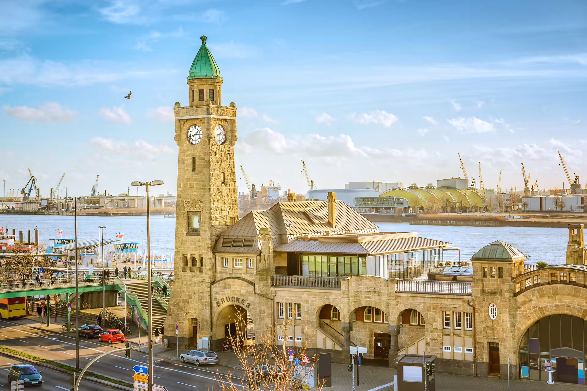 St. Pauli Landungsbrücken clock tower on Hamburg waterfront, key stop on Old Town & HafenCity audioguide walk