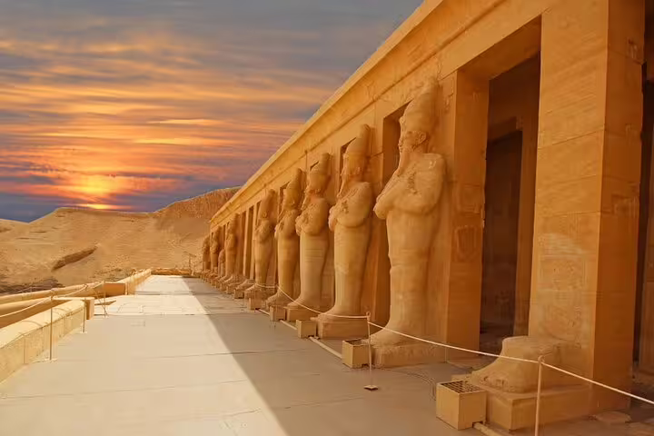 Hatshepsut Temple colonnade at sunset, Luxor historical day tour by bus from Hurghada, Egypt