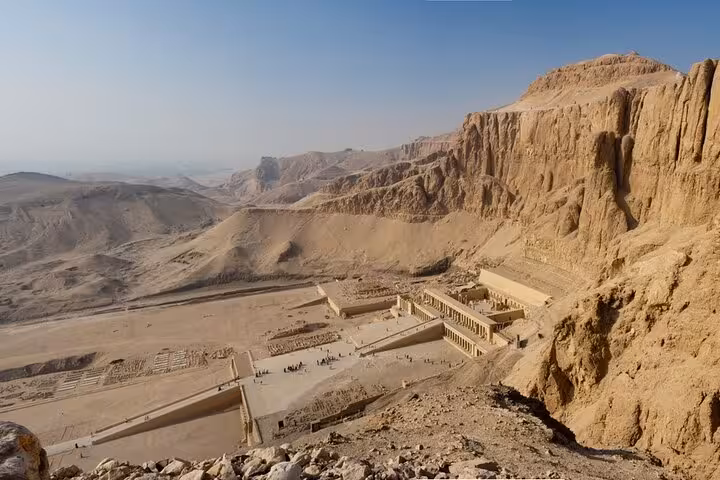 Hatshepsut Temple at Deir el-Bahari seen from cliffs, a highlight of Cairo to Luxor day tour by flight