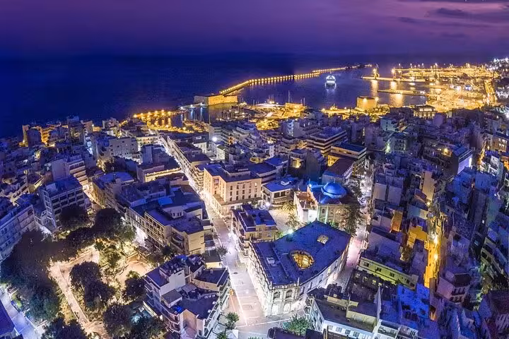 Heraklion city night skyline and Venetian harbor lights, a highlight of the Knossos day tour from Rethimno