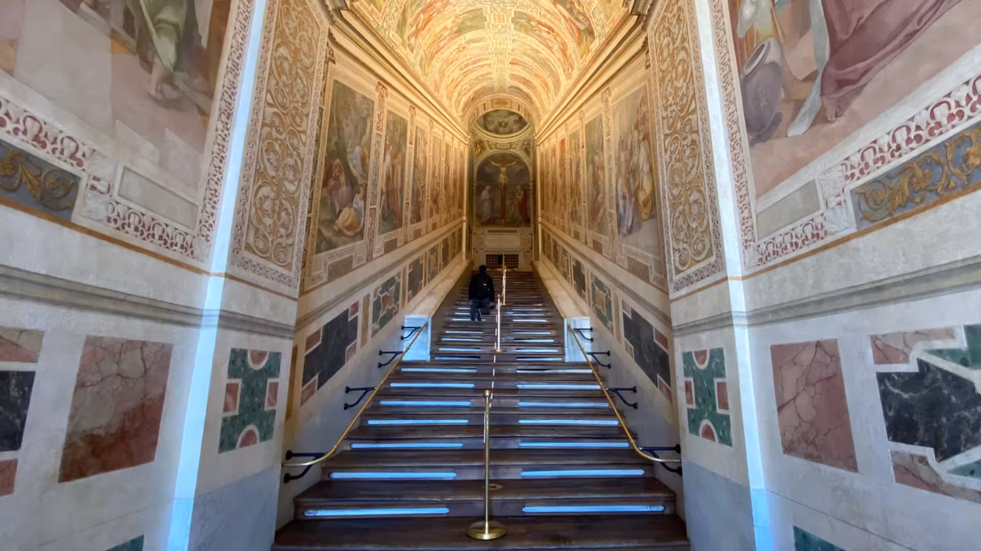 Ascend the Holy Stairs in Rome, adorned with frescoes, as part of our exclusive catacombs and Christian history tour.