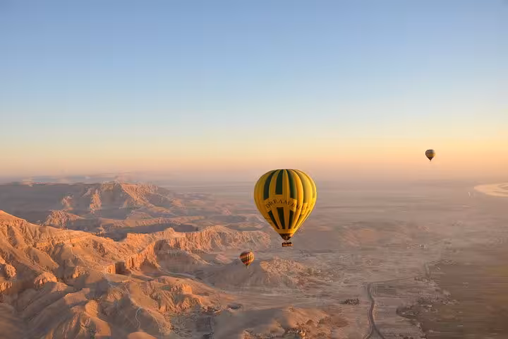 Hot air balloon flight above Luxor desert and Nile Valley at dawn, private overnight tour from Hurghada