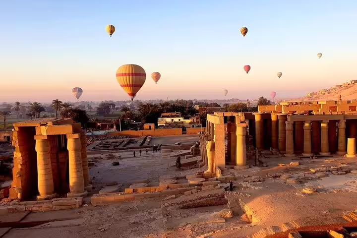 Hot air balloons over Luxor temples at sunrise, panoramic West Bank view with convenient hotel transfers