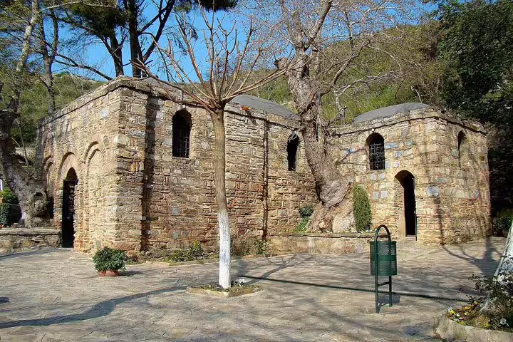 Exterior of the historic House of Virgin Mary, a key attraction on the Ephesus tour from Kusadasi.