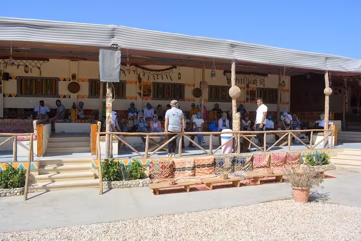 Bedouin-style camp seating in Hurghada for family safari dinner and show after ATV quad and Jeep tour