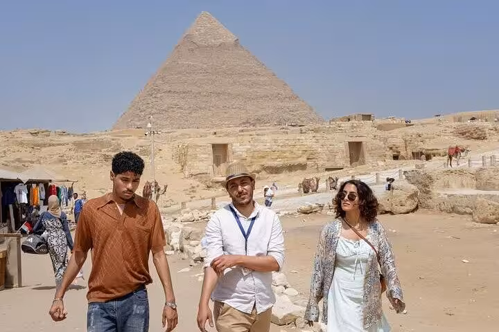 Private guided tour group at Giza Pyramids on Hurghada to Cairo day trip with expert Egyptologist guide