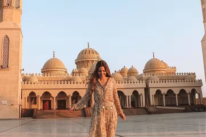 Woman visiting Hurghada Grand Mosque courtyard on private city tour, top highlights and shopping stop