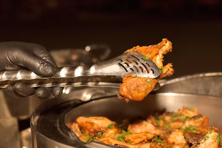 Grilled chicken served at Hurghada family safari dinner buffet after 1-hour quad and buggy ride and desert show