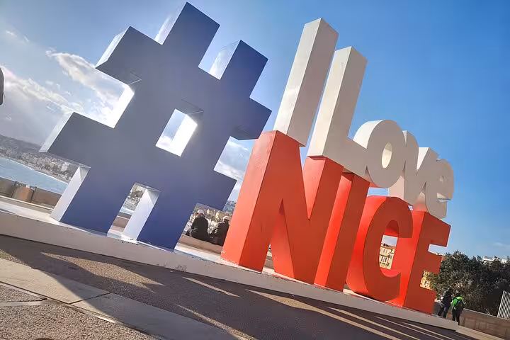 Iconic #ILoveNice sign overlooking the Mediterranean, a photo stop on a private day trip to Eze and Monaco