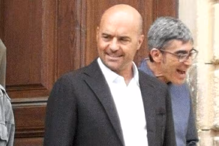 Actors on set filming Il Commissario Montalbano scene, capturing the essence of Sicilian detective drama.