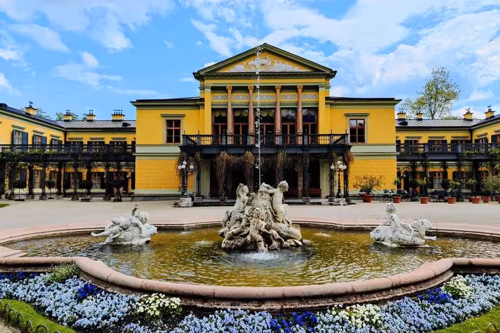 Imperial Villa Bad Ischl exterior with fountain courtyard, highlight of Hallstatt private day tour from Salzburg