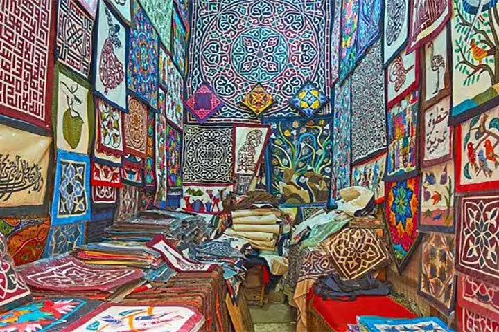 Vibrant Islamic art and embroidered textiles at Cairo bazaar stop on National Museum to Citadel & Bazaars tour