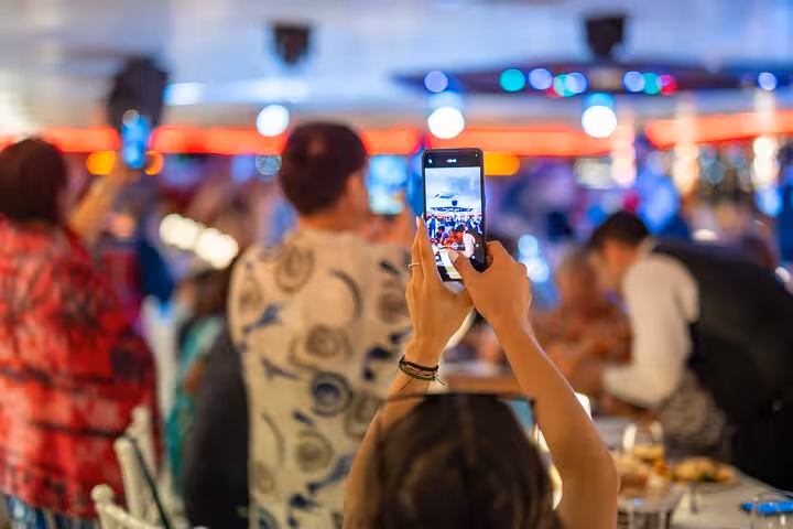 Guest filming the New Year’s Eve dinner cruise party on the Bosphorus in Istanbul with live show