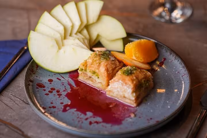 Baklava dessert and fresh fruit served on Istanbul Bosphorus New Year’s Eve dinner cruise party