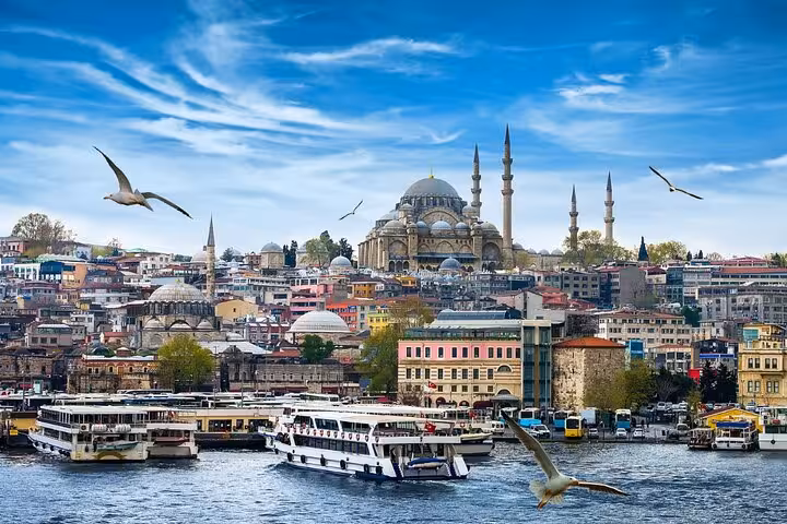 Istanbul skyline with Suleymaniye Mosque and Bosphorus ferries, highlight of the 8 Day Touch of Mediterranean Tour