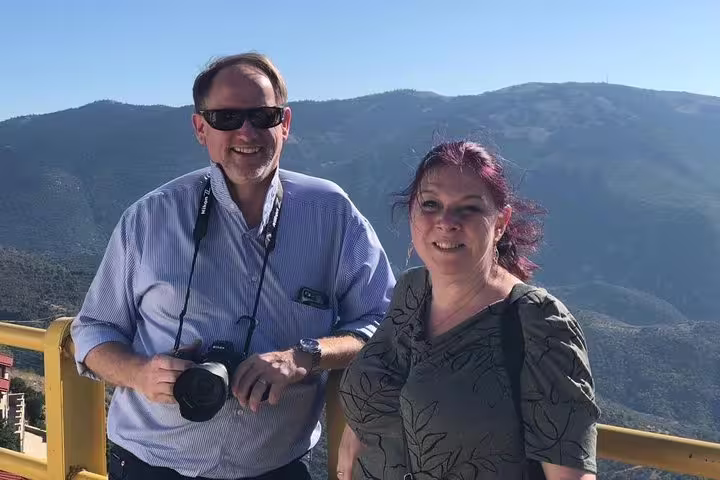 Couple at Bursa mountain viewpoint on private day trip from Istanbul, enjoying panoramic Uludag scenery
