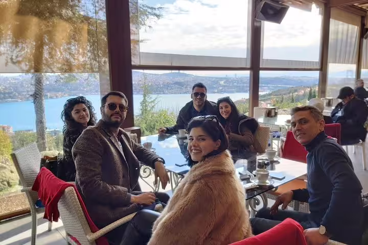 Private Istanbul sightseeing group enjoying Bosphorus view café stop with flexible itinerary and local guide