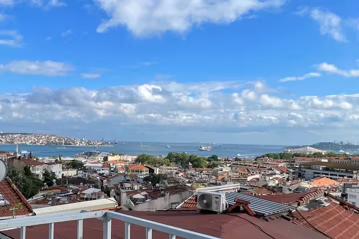 Rooftop view over Istanbul rooftops to the Bosphorus, a scenic stop on a 3-day neighborhood immersion tour