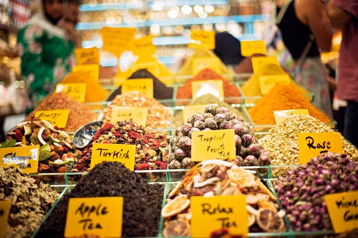 Spice and tea stall at Istanbul Spice Bazaar with Turkish tea blends and herbs on a private guided city tour