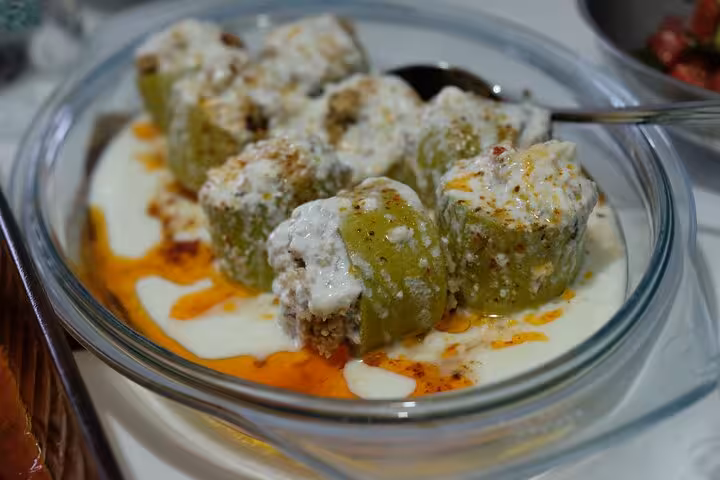Stuffed green peppers with yogurt and chili butter, tasting Istanbul home cooking on a local life tour