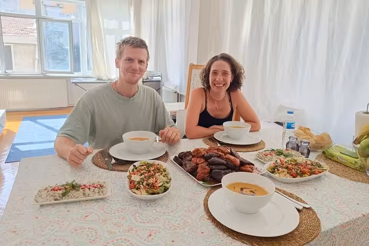 Guests enjoying homemade Istanbul vegan vegetarian meal at a locals home cooking class with Turkish meze