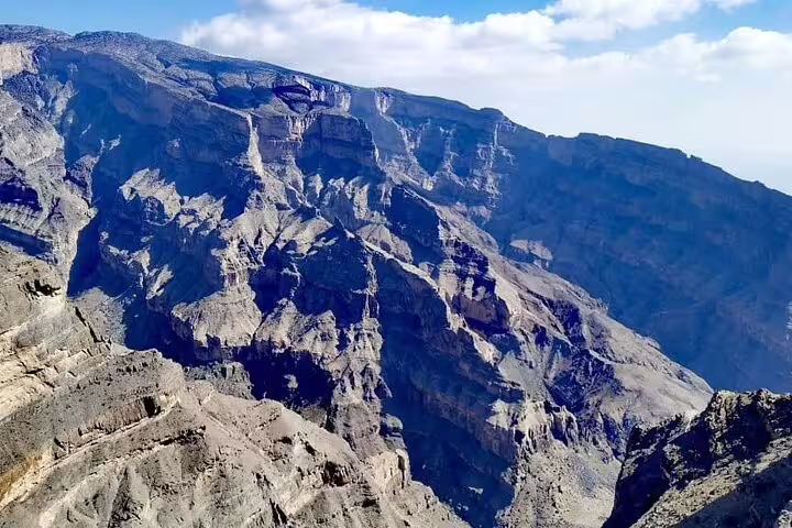 Discover the breathtaking views of Jebel Shams, Oman's Grand Canyon, on the 5 Days 4 Nights Oman Package Tour Mohammed.
