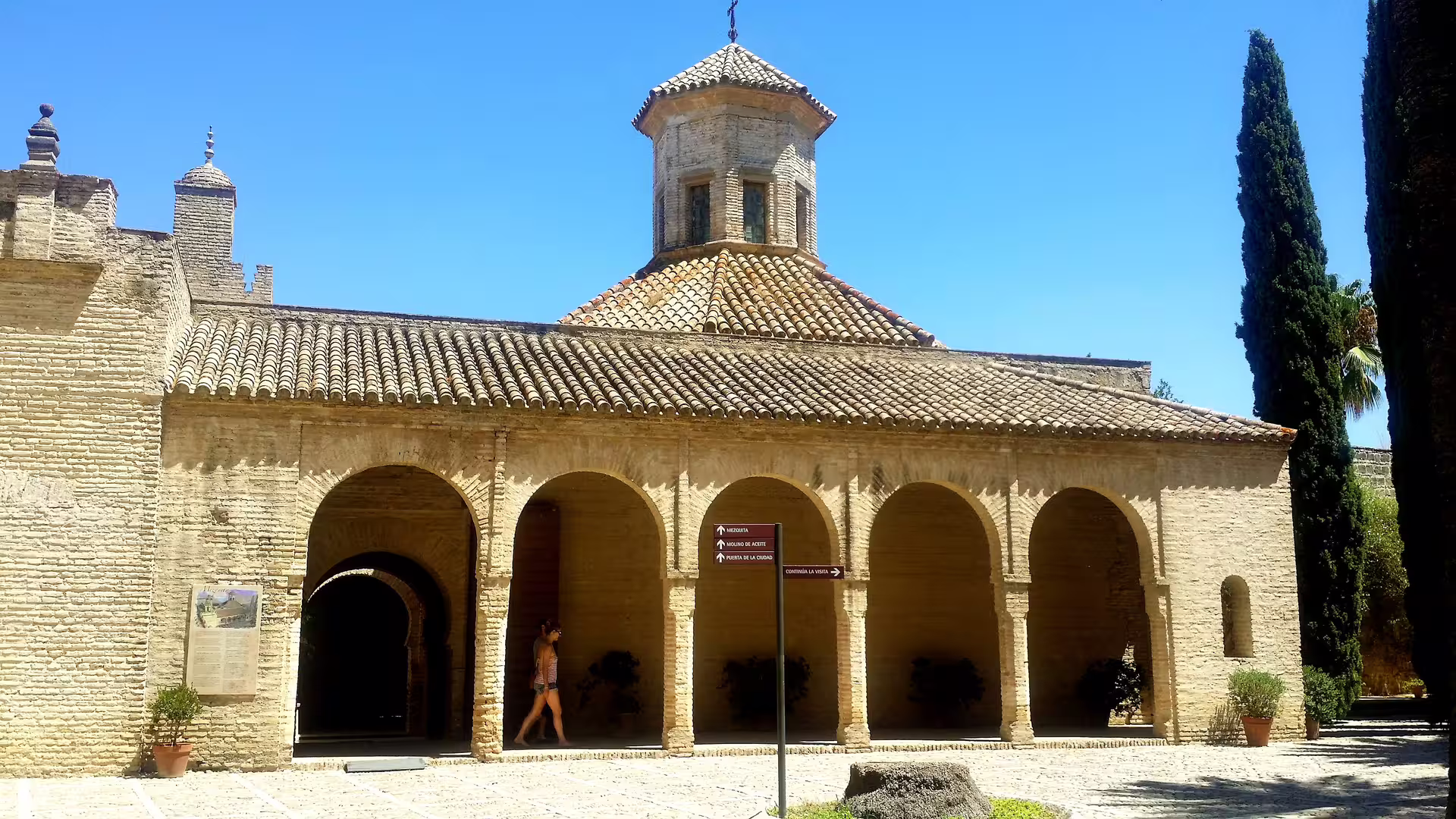 Arched cloister and tiled dome in Jerez historic center on private tour with hotel pick-up from Costa del Sol