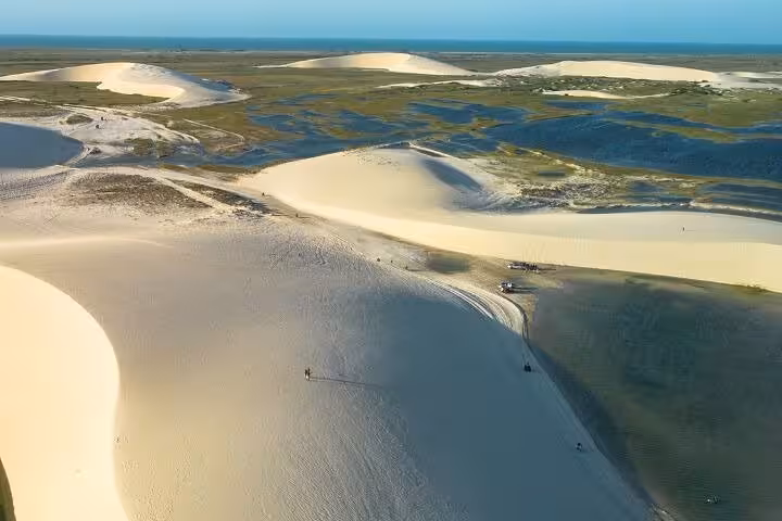 Aerial view of Jericoacoara dunes and lagoons, scenic route on airport transfer to Jeri hotels