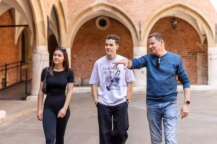Tour guide provides insights into World War II history as guests explore the Jewish Ghetto on a walking tour.