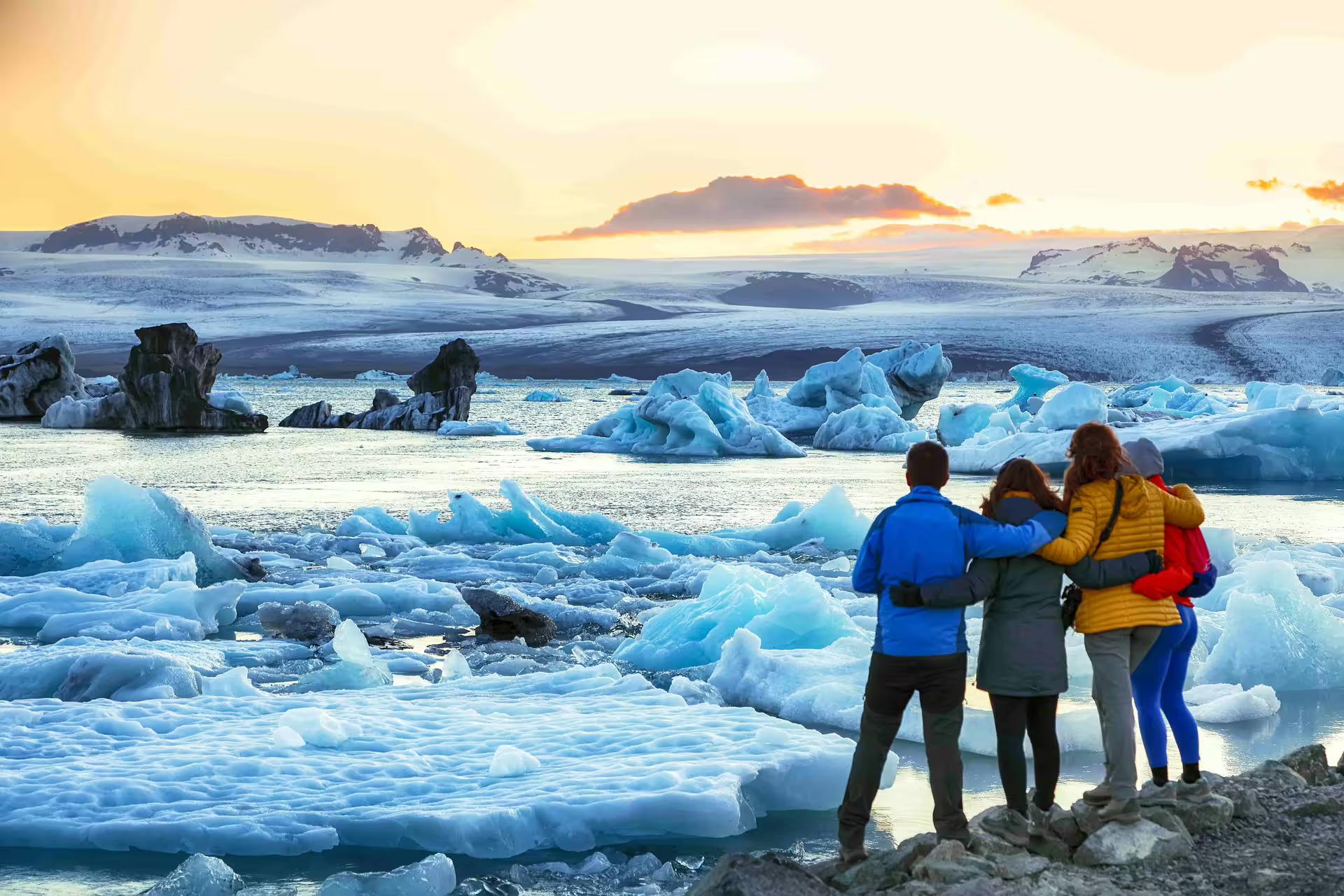 Travellers enjoying the unique landscape of Jokulsarlon